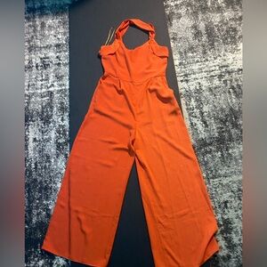 Mango size 2 red jumpsuit with across the back straps